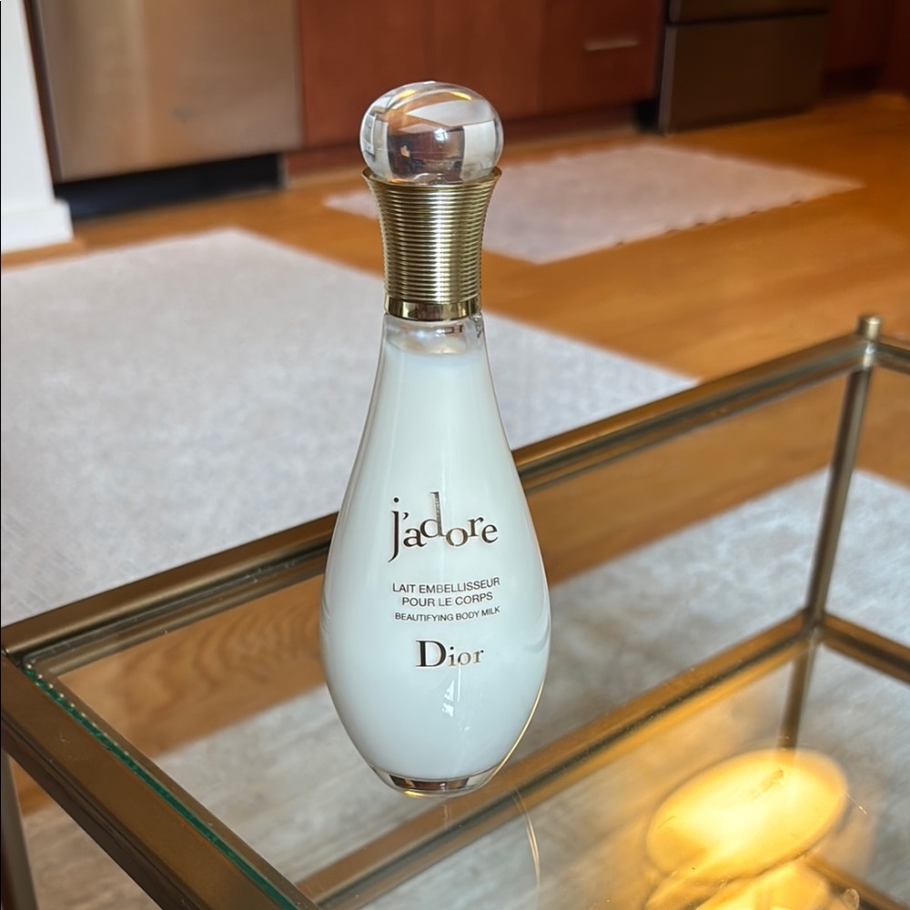 Dior j’adore Beautifying Body Milk Cream Bottle with Subtle Gold Detail